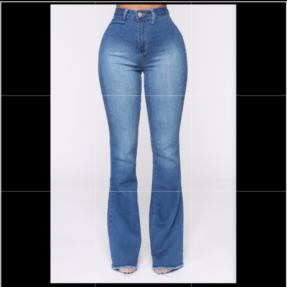 High waist, medium wash flare jeans.